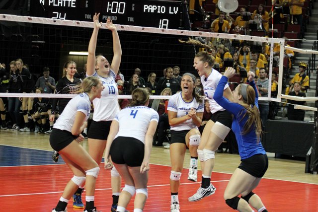 North Platte High School girls celebrate their advancement in the state tournament. 
