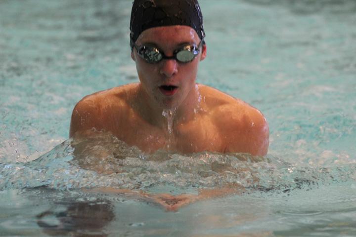 Sophomore Jamon Davis swims the breastroke at the Dawgs home meet on January 28.