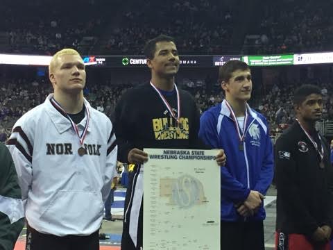 Sophomore Braiden Ruffin stands atop the podium at the State Wrestling tournament in Omaha, Nebraska on February 20, 2016
