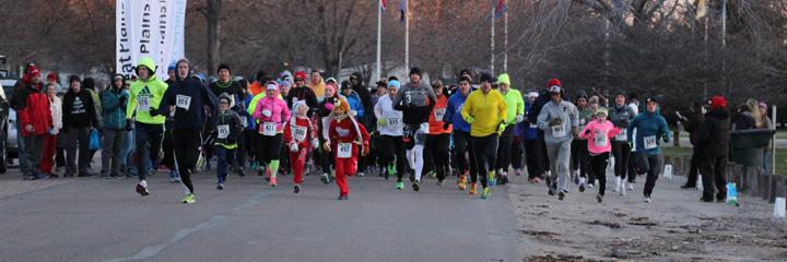 Runners take off at the Light-Up the Night 5k for Make-a-Wish.