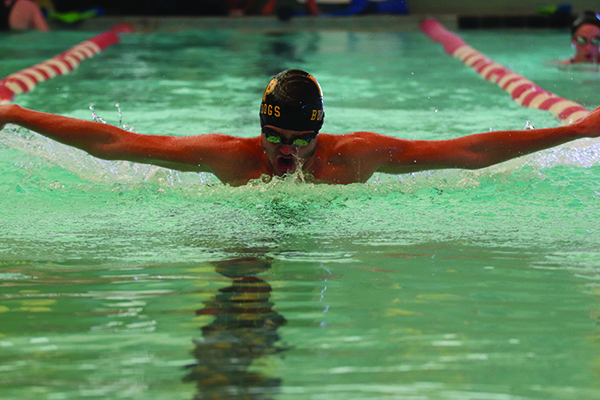 Montana Heffernan swims butterfly to prepare for the upcoming swim season.