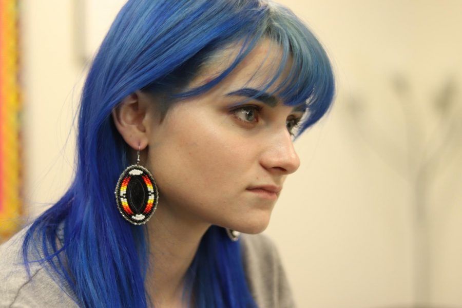 Freshman Joey Greenamyre wears her traditional tribal earrings. Greenamyres grandma beaded them for her, and she wears them almost every day. I try to fit in and dress how other people do, but Im also trying to stick with my original culture, she said. Photo by Gracia Lantis.