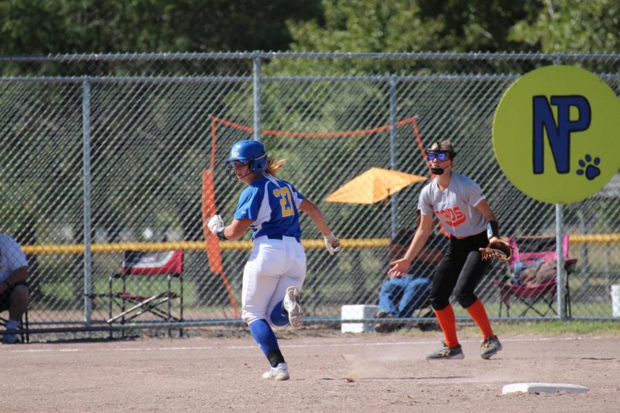 Senior Karsyn Buttler runs bases at their varsity softball tournament. This was Buttler’s last year, and her third year making State. “We went in confident and gave it our all” said Buttler.   