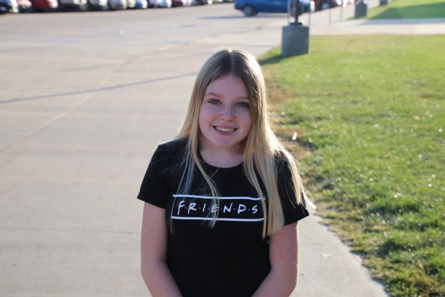 Freshman Makenna Snider poses for a picture in front of NPHS.