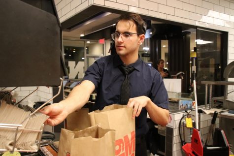 Junior Will Kramer working the night shift at McDonald’s. “I like the challenge of running around and covering three positions, but inside you’re mentally screaming,” he said. 