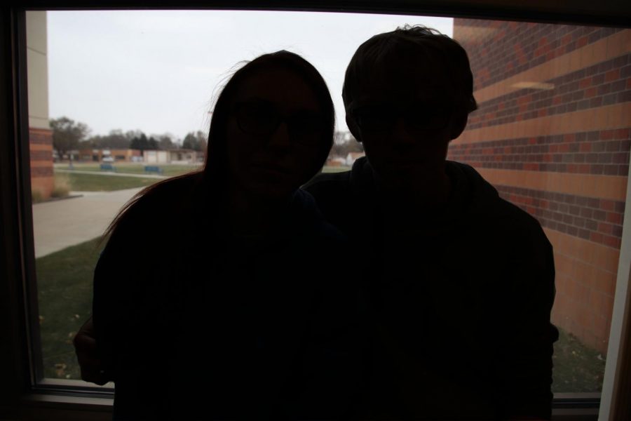 Shown is a silhouette of a couple at NPHS holding each other