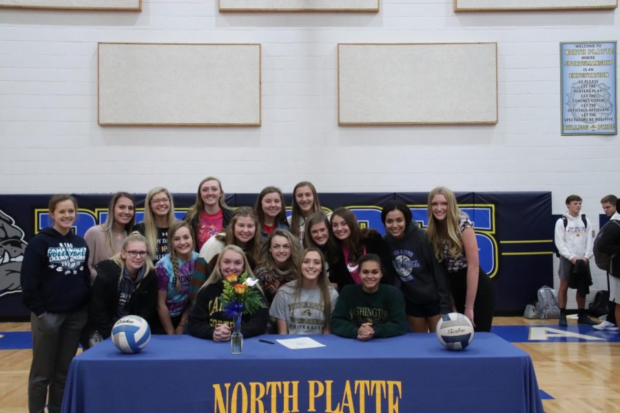 Kelsey Salazar-Allen posing with her NPHS volleyball teammates. Im excited to go and continue learning, especially among people at different levels, and to also build a new family with my new teammates.