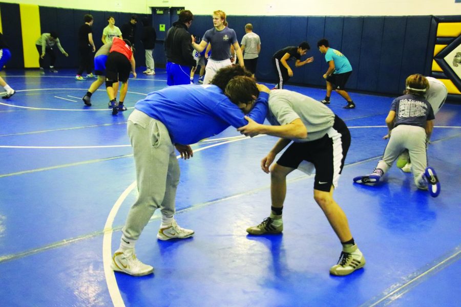 Two wrestlers tie up at the first practice of the season at North Platte High School on Nov. 18. 
