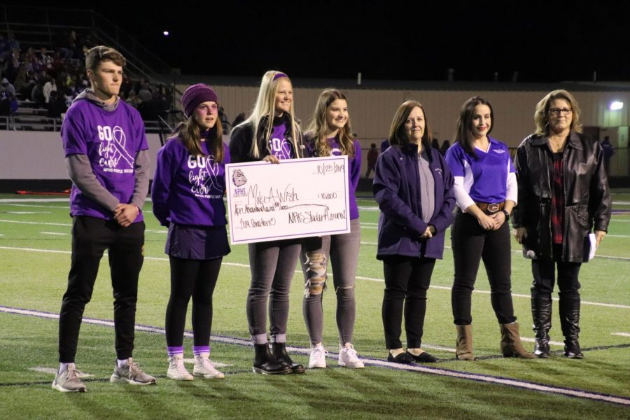 NPHS Student Council presents the donation check of 10,000 dollars to the Make-A-Wish foudnation. 