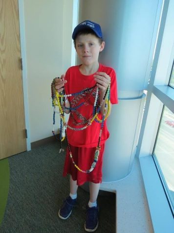 The beads in this picture represent everything Darin went through while having cancer treatment. Each bead represents something different. Red is blood transfusions, white is hospital stays and yellow is chemo. There are different beads for radiation, scans, blood draws and out patient stays that arent in that specific string of beads. 