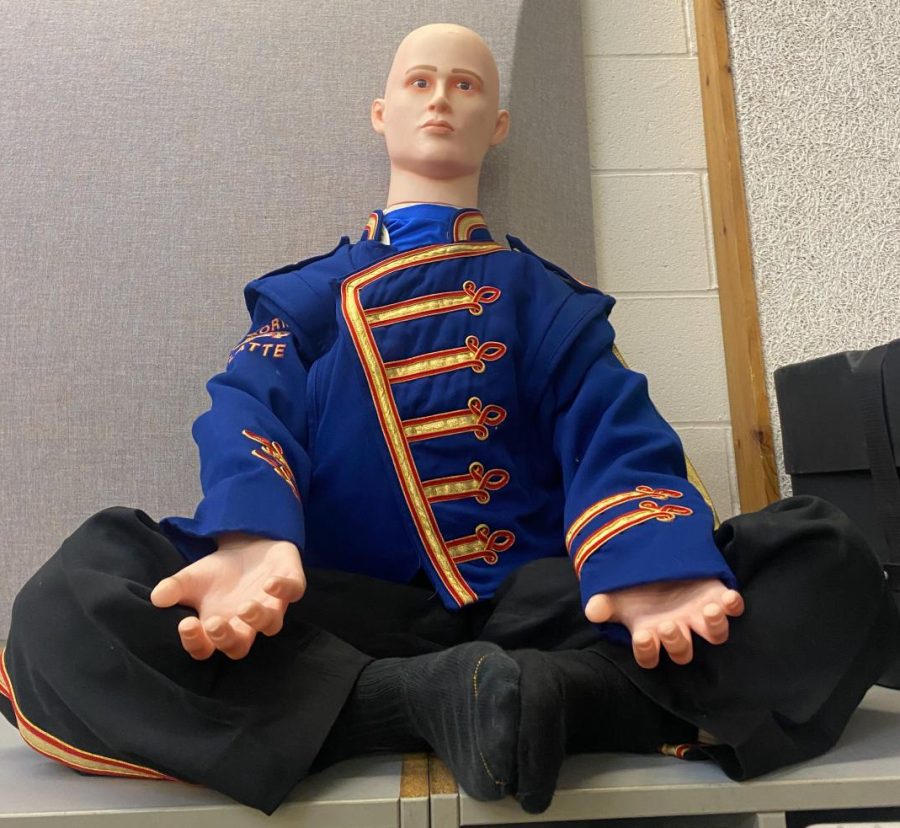 David gets zen in a yoga pose in the band room.
