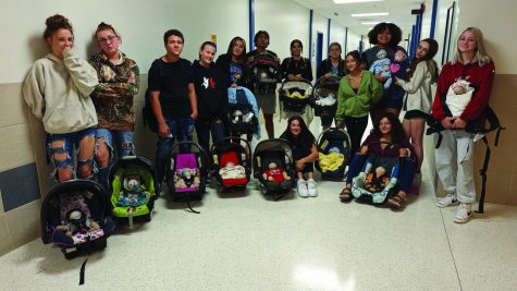 Mrs. Odle’s fourth period class poses with their flour babies.