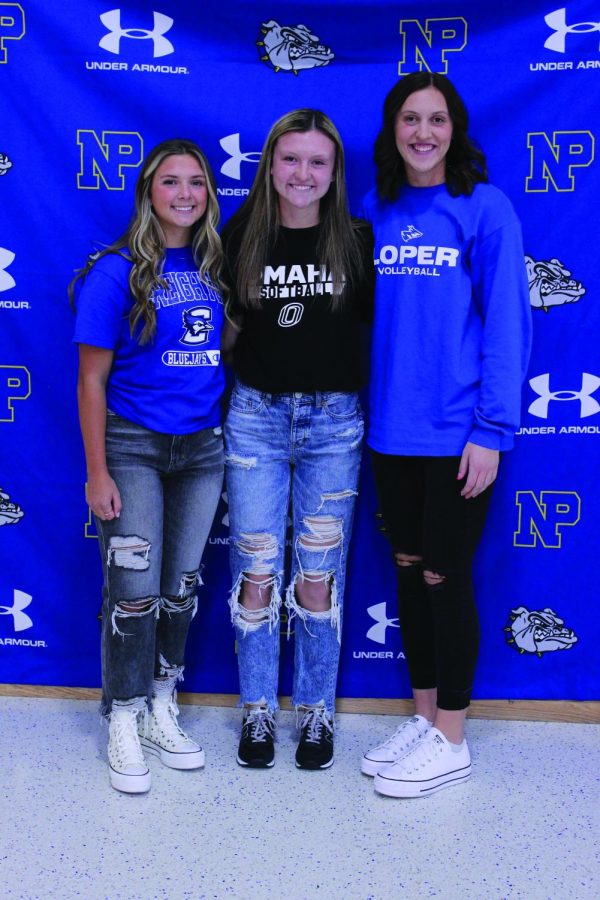 Three senior Bulldogs signed college sports contracts for next year. From left, Karsen Morrison will play golf at Creighton, Tatum Montelango will play softball at the University of Nebraska at Omaha and Carly Purdy will play volleyball at the University of Nebraska at Kearney. “I’m really excited,” Purdy said. “I am walking into a really good program and I am just super excited to play with those girls,” Purdy said.
