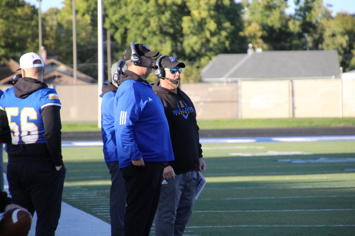 The Bulldog coaches watch a play unfold at the homecoming game on Oct. 6 at Bauer Field. 