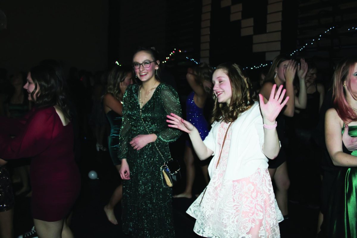 Reegan Nickerson and Addyson Vahle dance at Snowball on Dec. 1. 