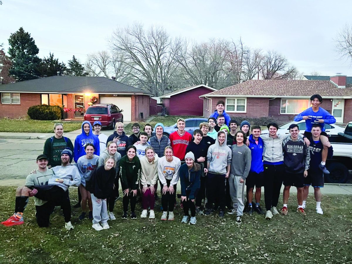 Winter Warrior runners gather together during a run. 