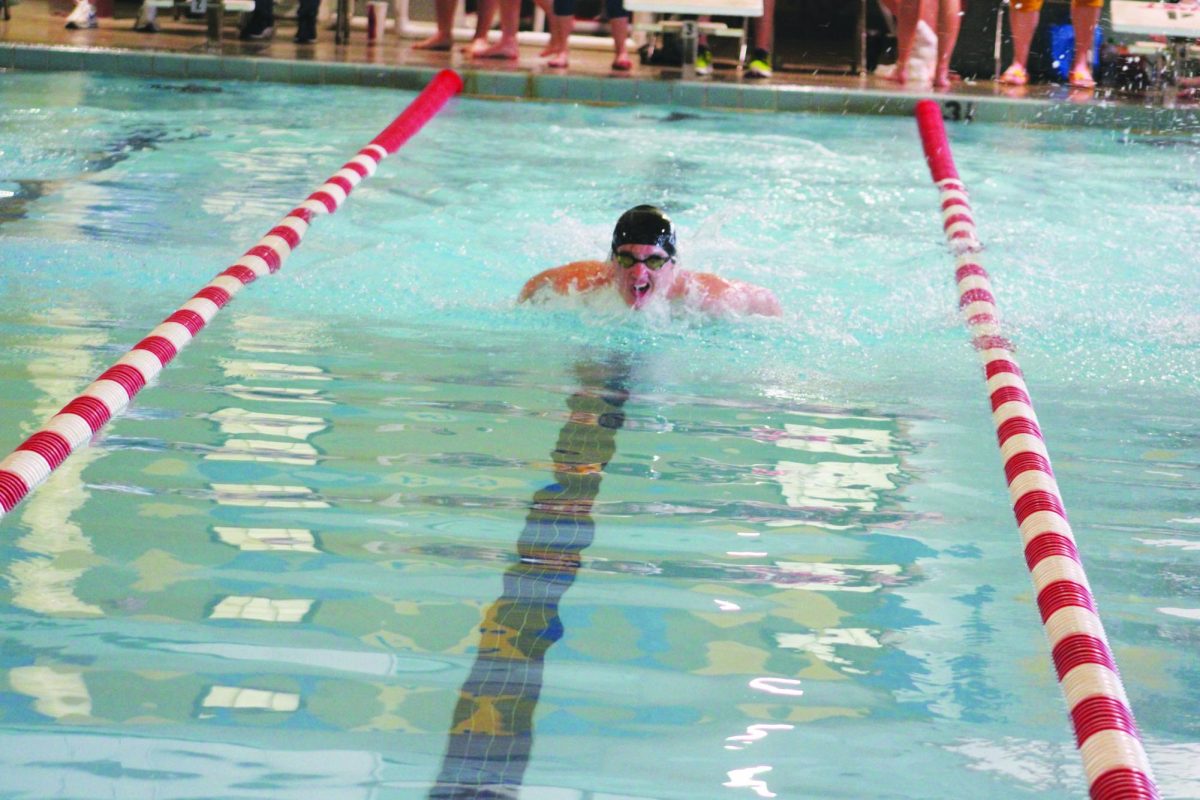 Senior Noah Short comes up for air during the butterfly at the home swim and dive dual vs. McCook on Jan. 25 at the Rec Center. 