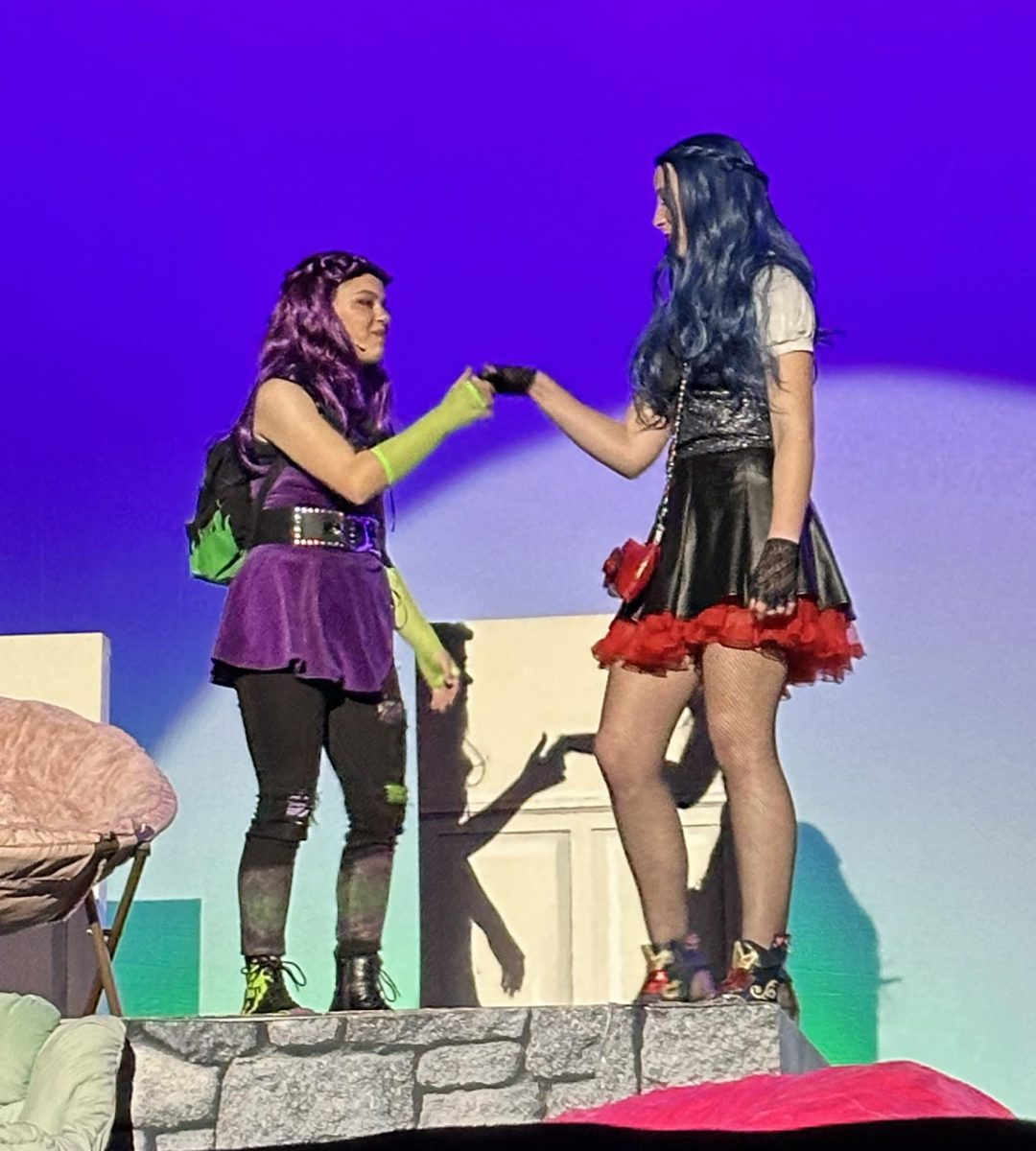 Mal and Evie, daughter of Grimhilde, played by sophomore Naomi Dekleva, prepare to go their separate ways.